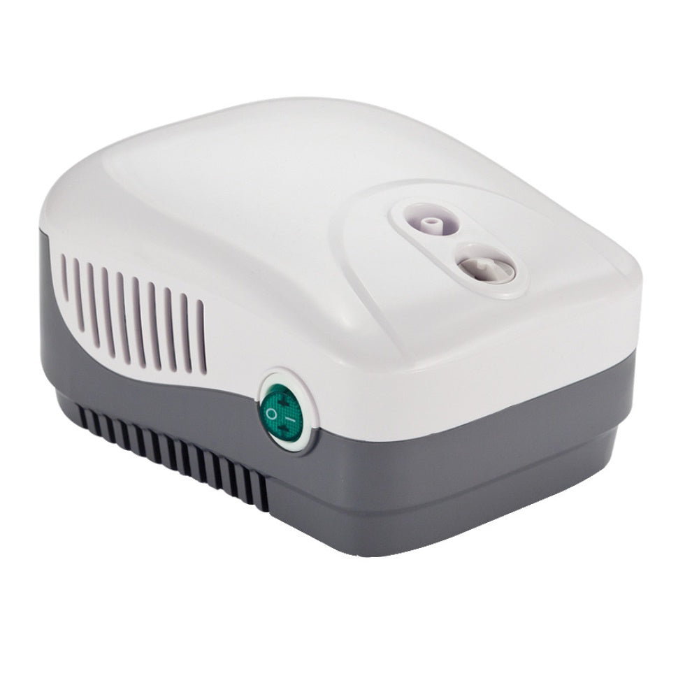The Drive MEDNEB+ Compressor Nebulizer Kit by Drive is a compact white and gray device with air vents, two top nozzle connectors, and a green side power switch for administering inhalation medication during respiratory therapy.