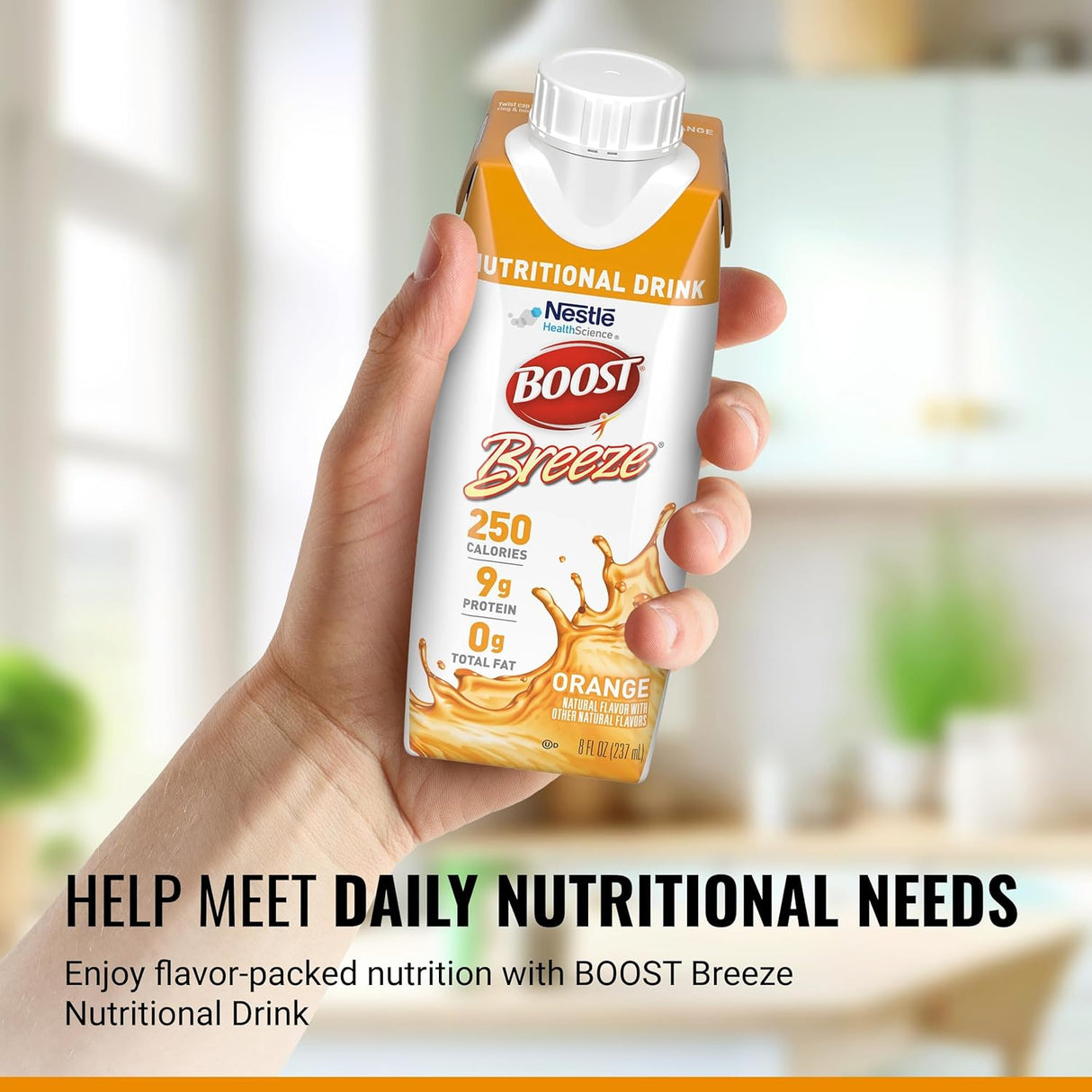 A hand holds a Nestle Nutrition Boost Breeze Orange 8 oz carton, highlighting 250 calories, 9g protein, and 0g fat. Help meet daily nutrition needs with this flavorful supplement. Product available in case of 24 cartons.
