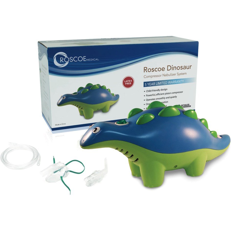 A green and blue dinosaur-shaped Roscoe Dinosaur Pediatric Nebulizer System with disposable neb kit by Roscoe Medical is displayed next to its box, offering a fun way to make breathing treatments easier for kids.