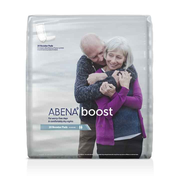 Package of Abena Boost Booster Pads by Abena, showing a smiling elderly couple hugging. The man embraces the woman from behind, while the 20-count heavy absorbency pack clearly displays product details.