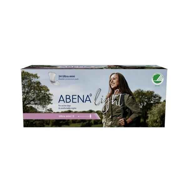 A box of Abena Light Ultra Mini 0 Bladder Control Pads by Abena, featuring a smiling woman outdoors with trees and sky. The eco-friendly box contains 24 light absorbency pads and highlights the Top Dry system for comfort.