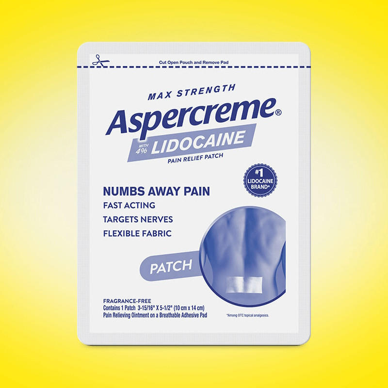 A packet of Aspercreme Max Strength Lidocaine Pain Relief Patch by Aspercreme is shown on a bright yellow background, with the packaging highlighting “Max Strength,” “Numbs Away Pain,” and 4% Lidocaine in bold blue and white text.