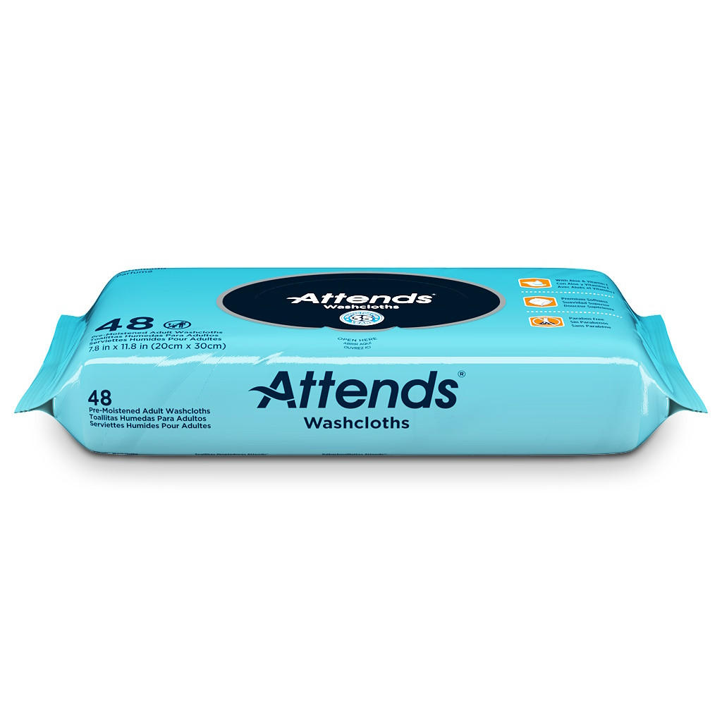 A blue pack of Attends Unscented Washcloths contains 48 moisturizing, pH-balanced adult washcloths. The Attends branding and product details appear in white and dark blue text against a white backdrop.