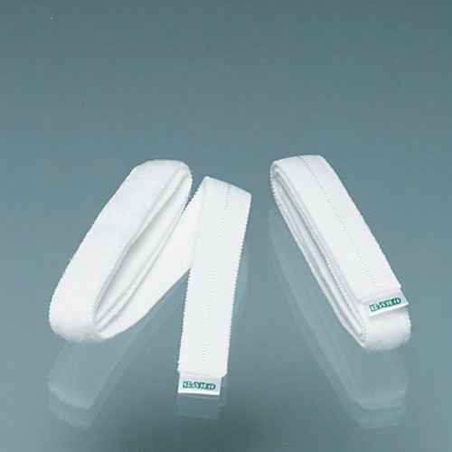 Two Bard Deluxe Fabric Leg Bag Straps by BARD, in white with green-and-white labels, rest on a reflective grey surface. These reusable, latex-free straps provide comfort and dependable support.