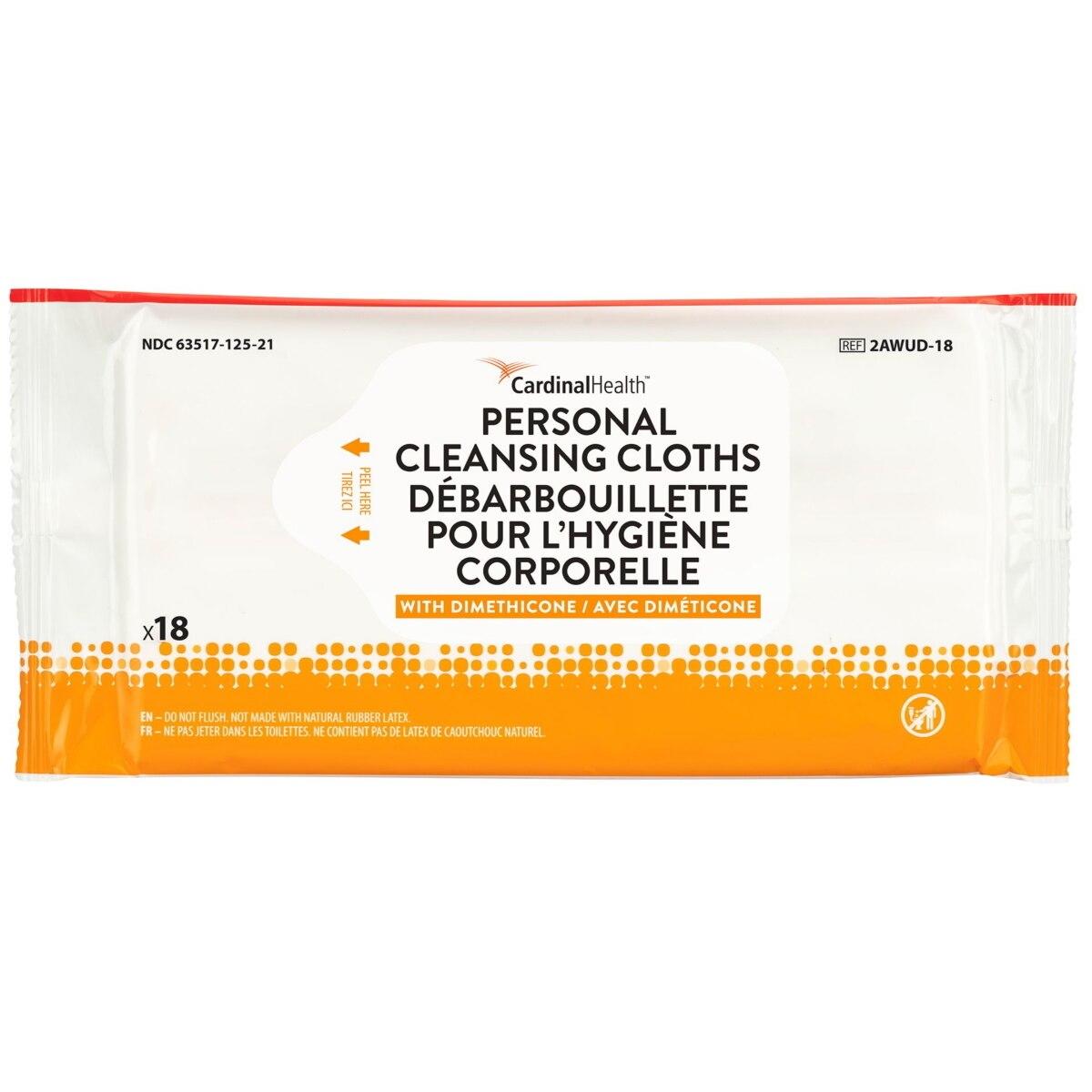 A package of Cardinal Health Personal Cleansing Cloths contains 18 no-rinse wipes with English and French text. The white packaging features orange accents and states it contains dimethicone.