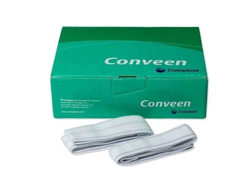 A green box labeled Coloplast Conveen Security+ Leg Bag Strap with Velcro Closure holds two white straps with silicone beading for urine bag support, shown on a white background.