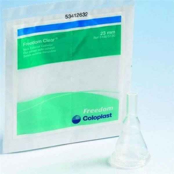 A Coloplast Freedom Clear Male External Catheter with Kink Resistant Nozzle, Silicone, labeled 23 mm, stands upright with the transparent, latex-free catheter and silicone sheath displayed in front of the packaging.