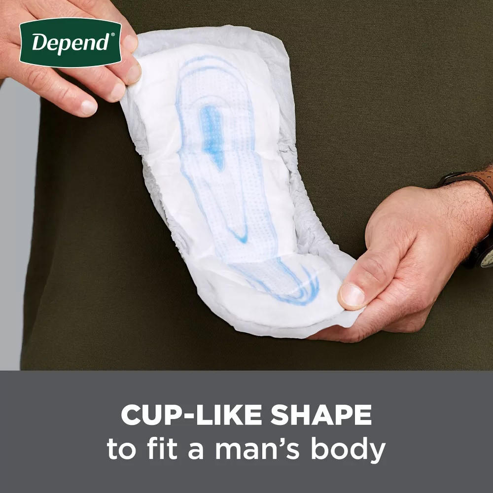 A person holds a Depend Incontinence Guard for Men by Depend with a blue absorbent area; text below reads, CUP-LIKE SHAPE to fit a mans body, emphasizing incontinence protection for men.
