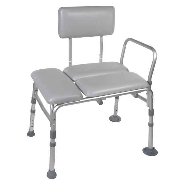 The Drive Padded Transfer Bench by Drive features height adjustment, a padded seat with an open gap, backrest, one armrest, rubber-tipped legs for stability, and tool-free assembly for easy setup.