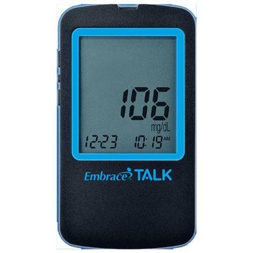 An Omnis Health EmbraceTALK No Code Talking Blood Glucose Meter displays a blood sugar reading of 106 mg/dL, with the time at 10:19 AM and date as 12:23. The device features “Embrace TALK” in blue text on its display.