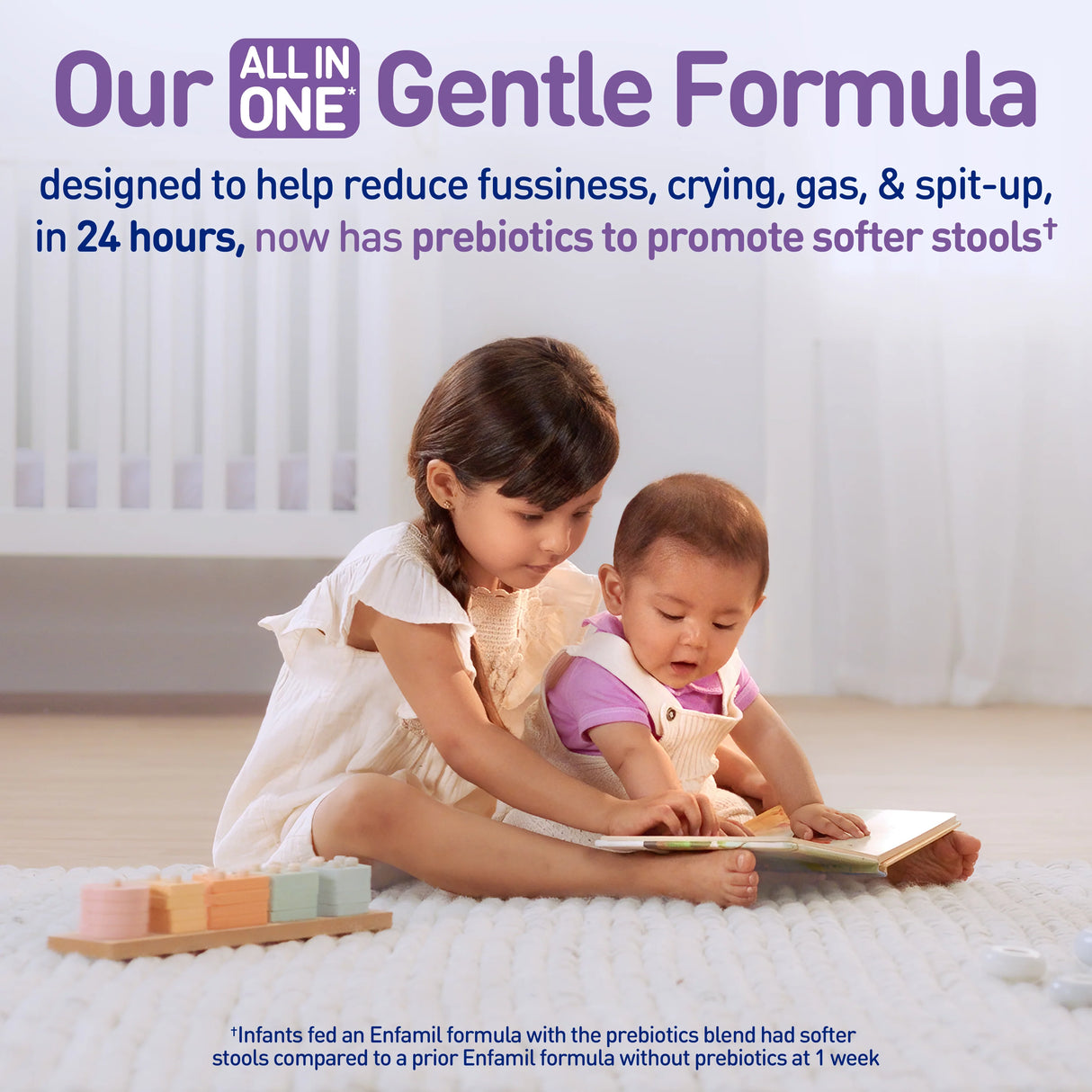 A young girl and a baby sit on the floor playing with a book. Text above highlights Enfamil NeuroPro Gentlease Infant Formula, Ready to Use, 6 oz Bottle—a gentle Enfamil solution for reducing fussiness and promoting softer stools.