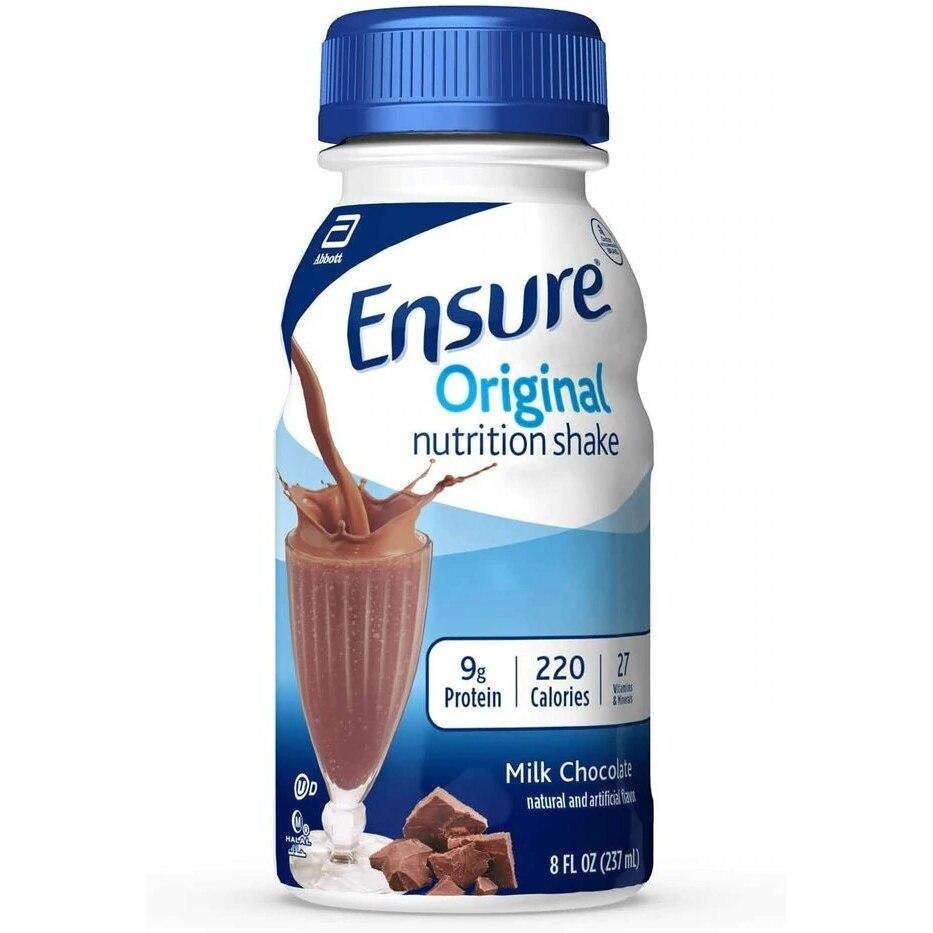 An 8 oz bottle of Abbott Nutrition Ensure Original Therapeutic Shake, Milk Chocolate, is shown next to a glass of chocolate shake and chocolate pieces. Each shake has 9g protein, 220 calories, and 27 vitamins and minerals (CS/24).