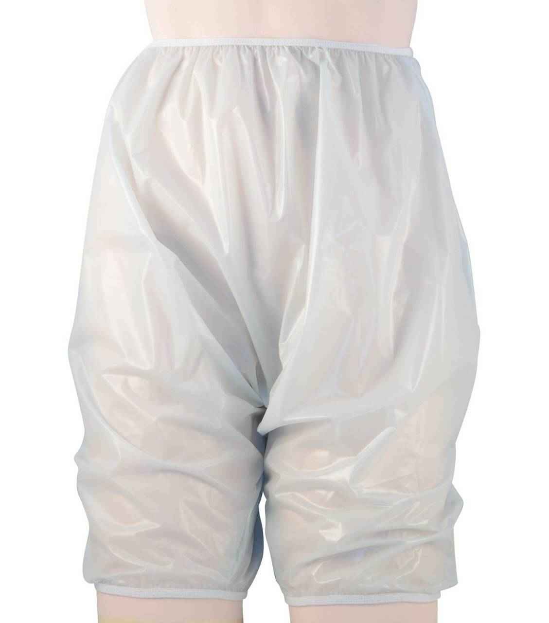 A person wearing Gary Pull-On Plastic Bloomers by Gary—semi-transparent, high-waisted adult waterproof bloomers with elastic waist and leg openings, reaching above the knees, designed for discreet incontinence protection.