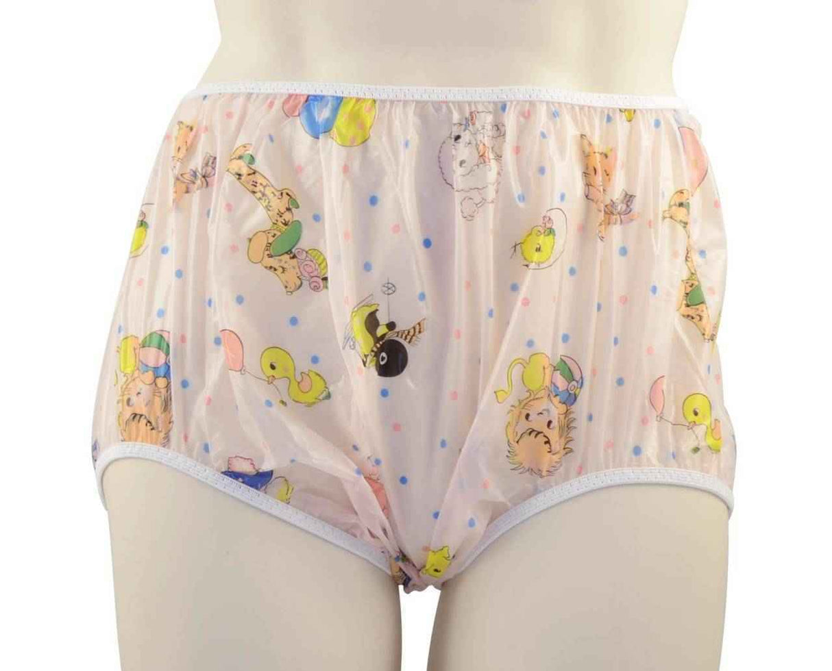 A mannequin models the Gary Pull-On Plastic Pant by Gary, featuring a high-waisted, pull-on design with colorful cartoon animal prints and small polka dots on a white background.
