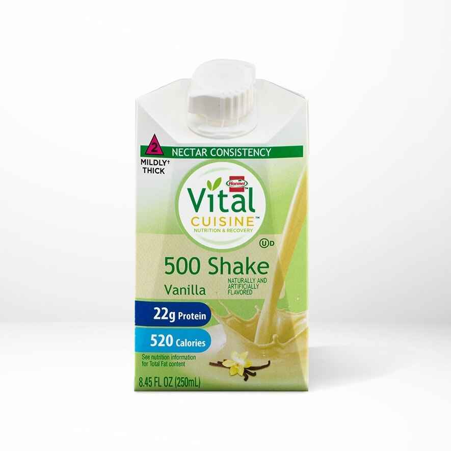 Hormel Vital Cuisine 500 Shake, Vanilla by Hormel Foods comes in 8.45 fl oz (250 mL) cartons, each providing 22g protein and 520 calories with mild thickness. Each case contains 27 shakes; packaging shows a vanilla flower and pouring shake.