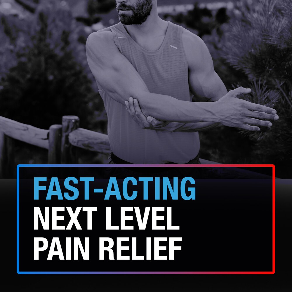 A man in athletic wear stretches outdoors. Overlaid text: FAST-ACTING NEXT LEVEL PAIN RELIEF with Icy Hot Pro Pain Relief Dry Spray, 4 oz from Icy Hot for effective muscle pain relief.