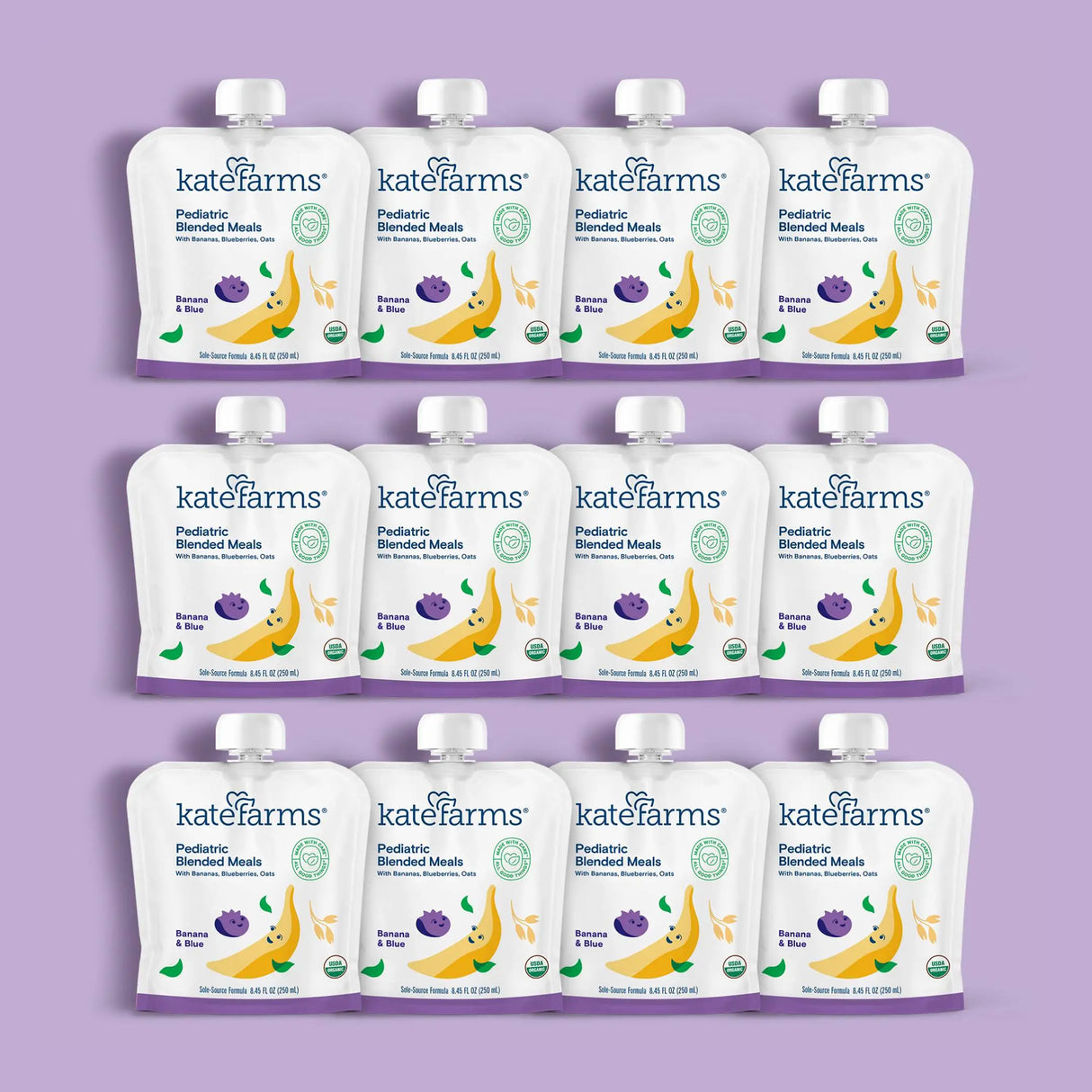 Twelve pouches of Kate Farms Pediatric Blended Meals, Banana & Blueberry, are arranged in three rows on a purple background. The pouches feature images of bananas and blueberries and are a tube feeding formula from Kate Farms.
