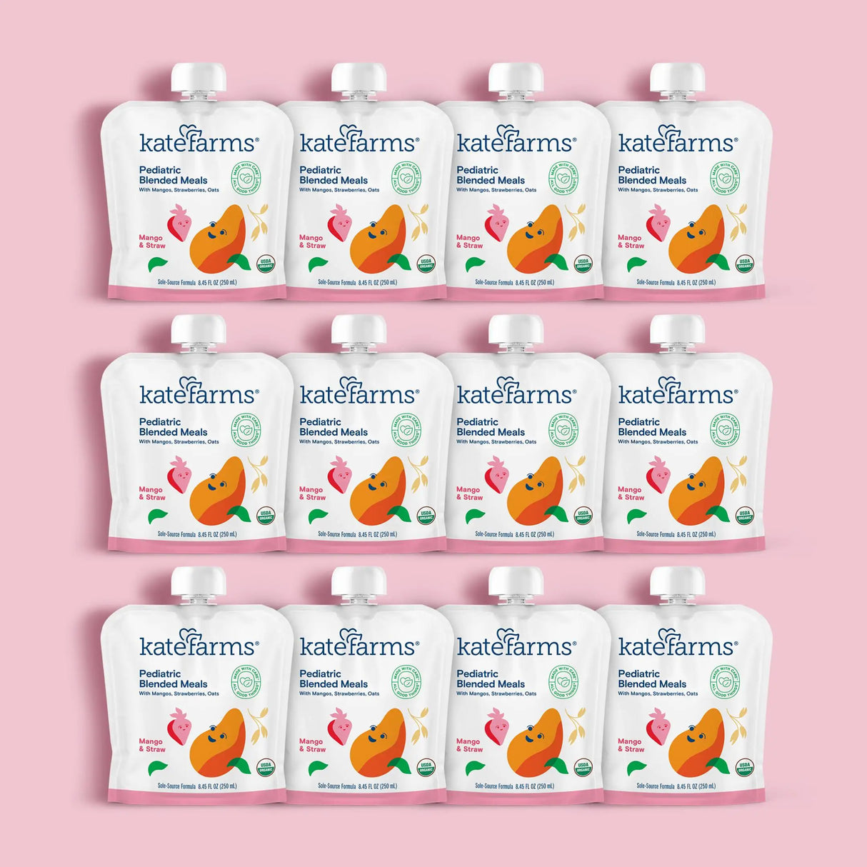 Twelve Kate Farms Pediatric Blended Meals, Mango & Strawberry pouches are displayed in three rows of four against a pink background, each featuring colorful fruit and vegetable imagery on the front.