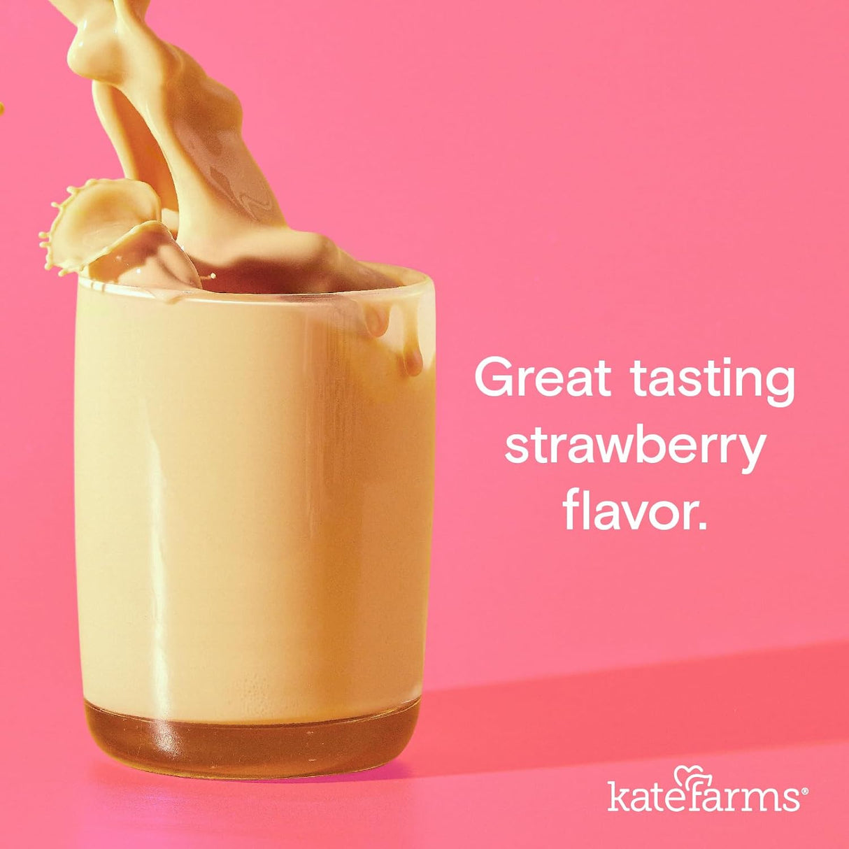 A creamy pink strawberry drink splashes from a glass on a bright background. White text reads, Great tasting strawberry flavor and plant-based nutrition. Kate Farms Pediatric Peptide Formula 1.0, Strawberry logo appears bottom right.
