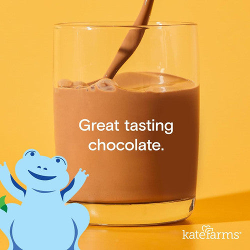A glass of Kate Farms Pediatric Standard Formula 1.2, Chocolate is poured with the text Great tasting chocolate. A cheerful blue cartoon frog waves at the lower left. The yellow background features the Kate Farms logo at the bottom right.