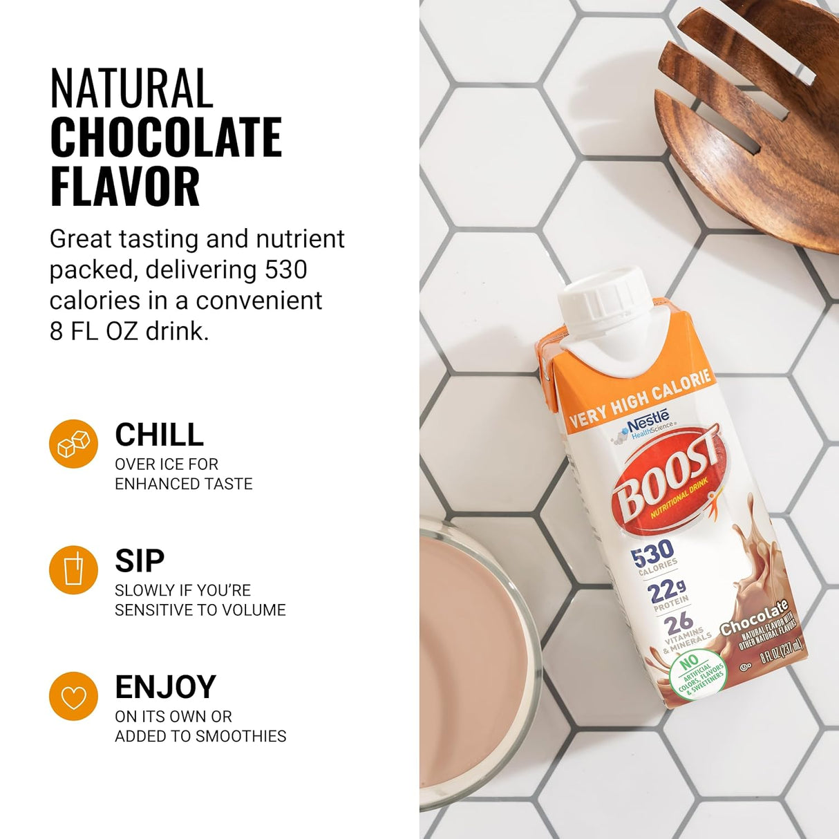 A carton of Nestle Boost Very High Calorie (VHC), Chocolate, 8 oz by Nestle Nutrition sits next to a glass of chocolate drink, a wooden bowl, and copper spoon on white tiles. Text highlights key features and serving suggestions.