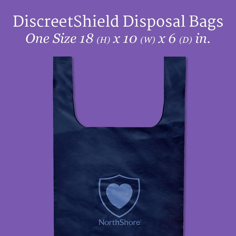 A dark blue NorthShore DiscreetShield Scented Adult Diaper Disposal Bag with handles is shown on a purple background. Text above reads: DiscreetShield Scented Adult Diaper Disposal Bags, 18 x 10 x 6 in. The bag features a heart and shield logo.