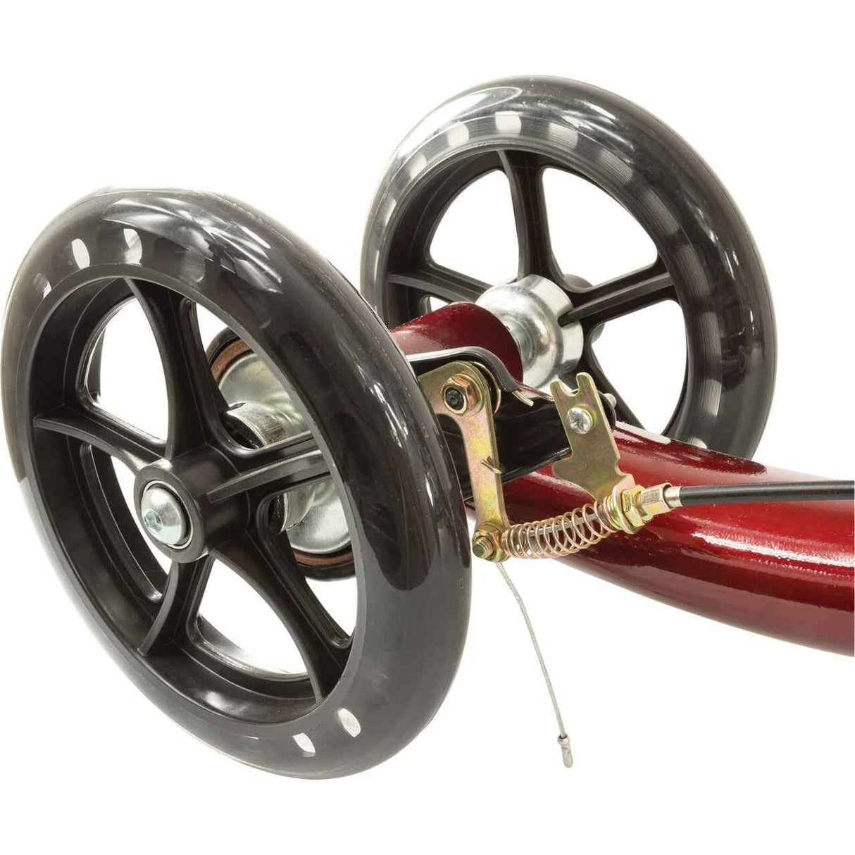 Close-up view of two black caster wheels attached to a red Roscoe Deluxe Knee Scooter frame by Roscoe Medical, highlighting the wheel axles, brackets, and tension spring on this essential mobility aid.