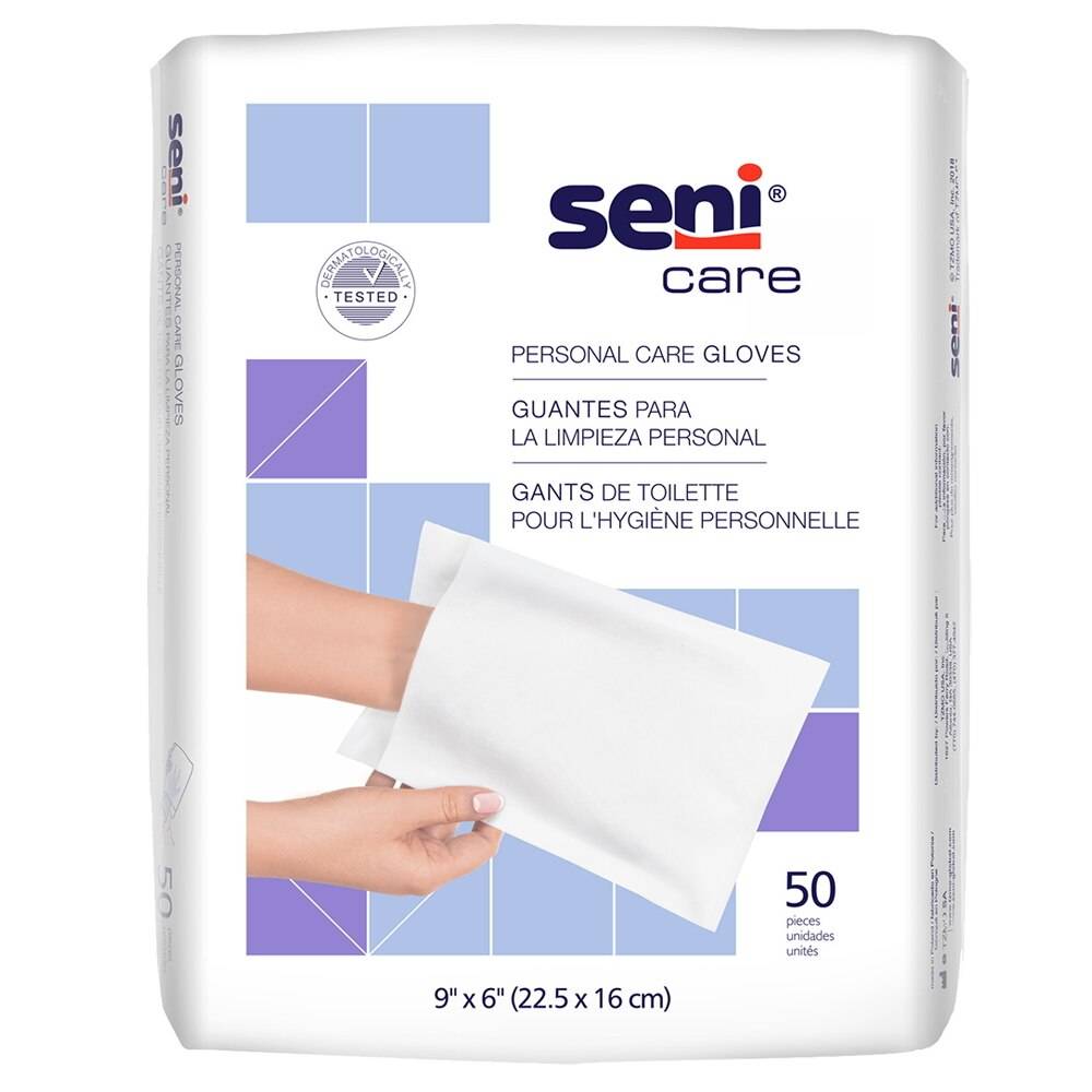 A pack of Seni Care Personal Care Gloves by Seni features bilingual English, Spanish, and French text. The package shows a hand with a white glove and includes 50 no-rinse cleansing gloves measuring 9 x 6 in (22.5 x 16 cm).