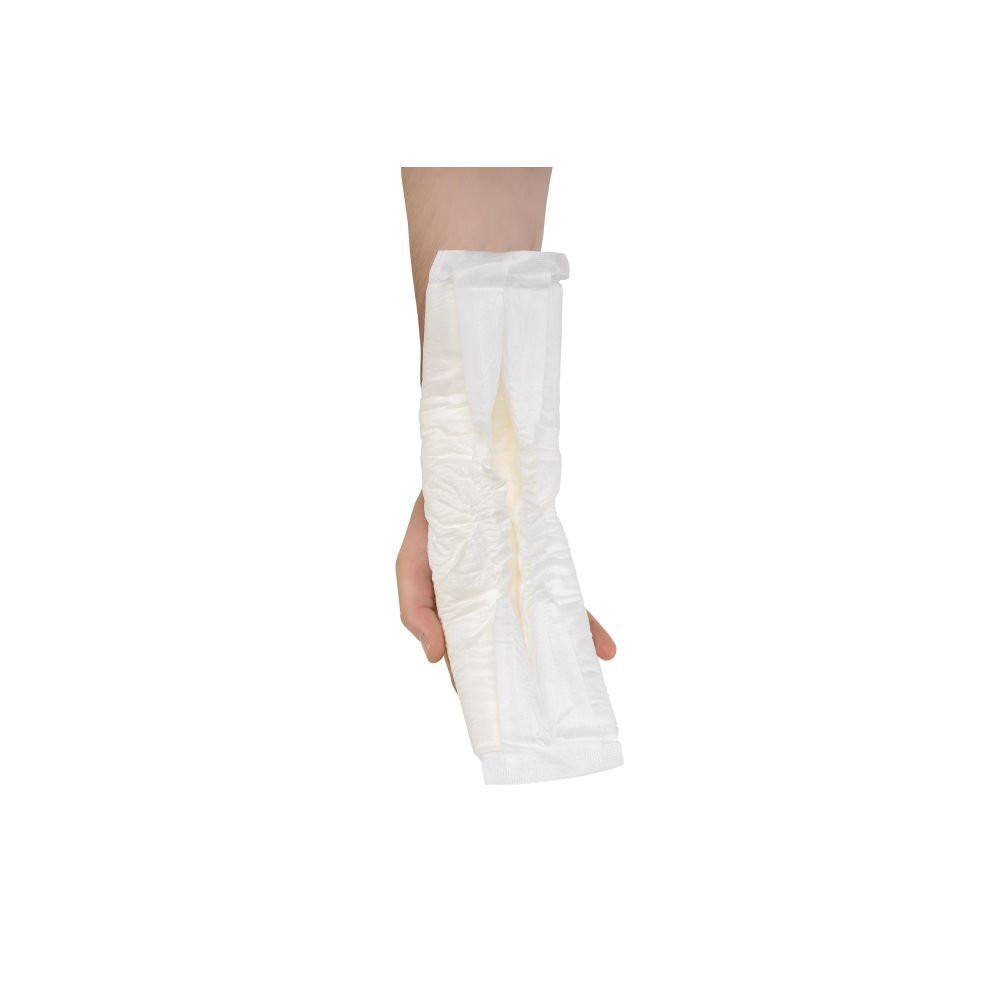 A hand holds a white Seni Man Fit Guard by Seni, designed for moderate absorbency, against a plain white background.
