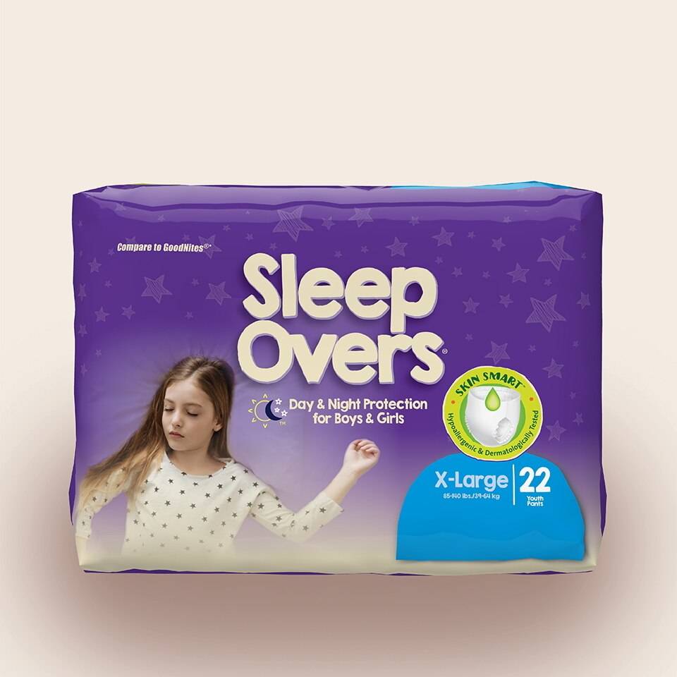 A purple package of First Quality Sleep Overs Youth Incontinence Pants by Cuties, X-Large (45-65 lbs), includes 22 pants with moderate to heavy nighttime protection for boys and girls, and features a girl with long brown hair.