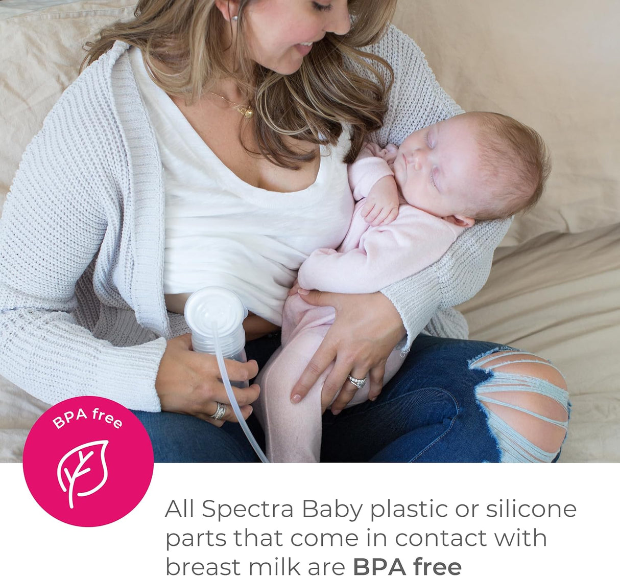 A woman in a white shirt and cardigan uses the Spectra 9 Plus Premier Portable Rechargeable Breast Pump by Spectra while holding a sleeping baby dressed in pink. Text below highlights “BPA free” Spectra Baby products.