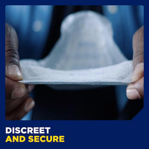 Close-up of hands holding a TENA for Men Guards, Maximum pad, with DISCREET AND SECURE in white and yellow text at the bottom left corner.