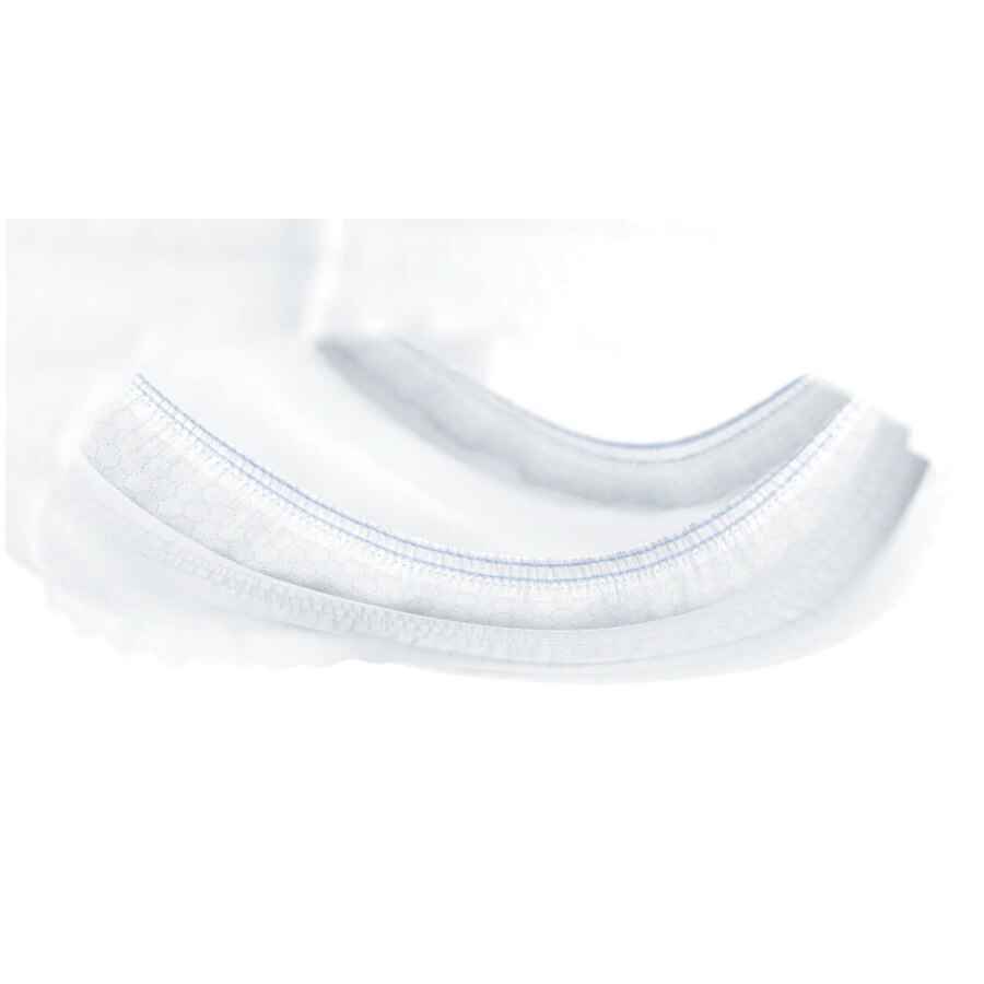 Close-up of the curved, white, padded material with stitching from TENA ProSkin Extra Protective Underwear by TENA, designed for bladder leakage protection, shown against a white background.