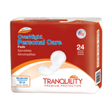 Tranquility Personal Care Pads by Tranquility provide 24 absorbent pads for moderate, discreet protection, with English, French, and Spanish text displayed on a red and white package.