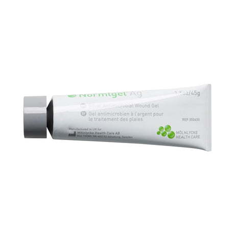 A tube of Normlgel Ag Silver Antimicrobial Wound Care Gel from Molnlycke, labeled in English and French, comes in a silver tube with green and black text—hydrogel wound care for infection prevention.