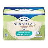 A package of TENA Sensitive Care Extra Coverage Moderate Incontinence Pads is displayed in green and white, featuring a pad illustration and emphasizing extra coverage plus 100% breathability for moderate bladder leakage protection.
