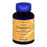 A blue bottle of Foster & Thrive Vitamin C Supplement features a vibrant orange label for antioxidant and immune support. This gluten-free, chewable supplement provides 500 mg vitamin C per tablet, 100 tablets total, with a natural orange flavor.