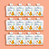 Twelve Kate Farms Pediatric Blended Meals, Squash & Carrot pouches are arranged in three rows on a peach background. The white and orange packaging features colorful fruit and vegetable illustrations. Brand: Kate Farms.