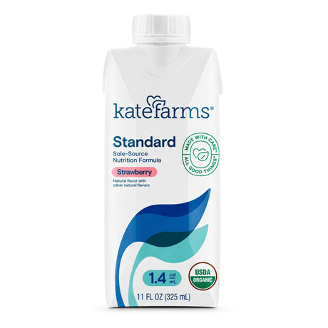 Kate Farms Standard Formula 1.4, Strawberry, CS/12 is a white 11 fl oz carton with blue-teal leaf graphics. This plant-based, USDA Organic formula offers calorie-dense nutrition from organic pea protein for tube feeding.