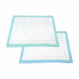 Two NorthShore Premium Extra-Absorbent Disposable Underpads, one with a teal border and one with a blue border, are overlapping on a white background.